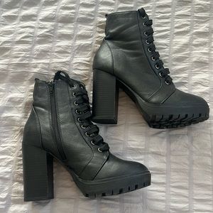 Black Heeled SODA brand combat boots. Worn a few times but in great condition